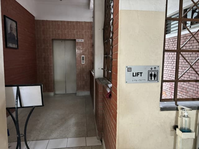 A picture of the location where our accessible signboard of lift is placed.