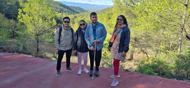 A group picture taken at the hiking spot which includes our Founders Abhishek Shahi and Deepika Shahi along with Fanny Collado - the President of Expedición Solidaria and Rajan Karmacharya - one of the exchange teachers from SXC.