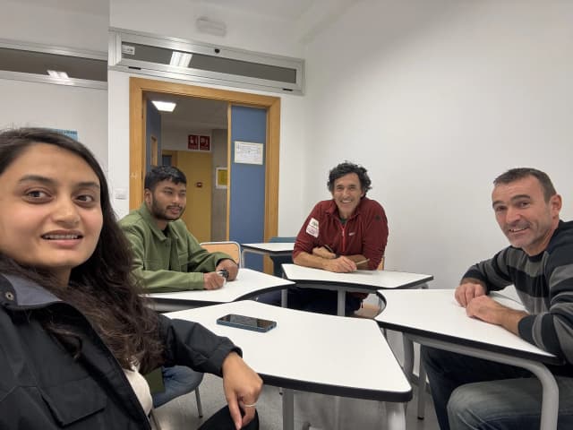 A selfie of our founders Abhishek Shahi and Deepika Shahi along with Mr. Alfonso Gonzalez and Mr. Rafael Armero - a sport teacher.