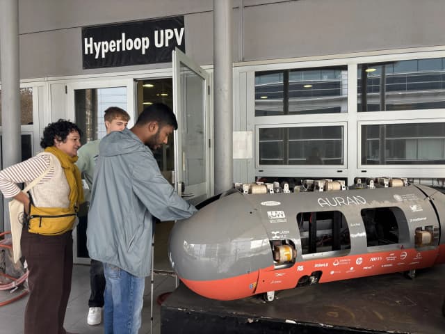 Our Founder Abhishek Shahi is touching the first prototype levitating train made from Hyper Loop team of UPV.