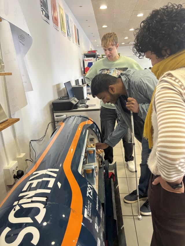 Our Founder Abhishek Shahi is touching the prototype of levitating train made by the team of Hyper Loop. In the background, one of the team member of Hyper Loop and Fanny Collado is also observed.