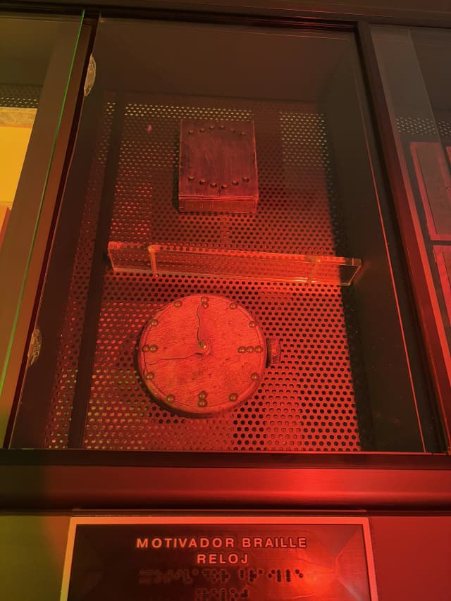 A picture of antic braille watch kept for display.