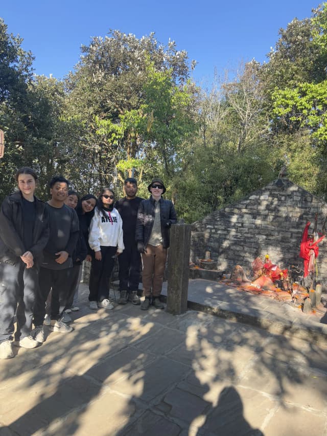 A group picture of 7 individuals including CFC executives, officers and international intern taken Infront of Champadevi temple.